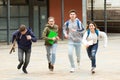 Teenager school kids running Royalty Free Stock Photo