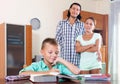 Teenager schoolboy doing homework Royalty Free Stock Photo