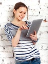 Teenager schoolgirl with tablet computer Royalty Free Stock Photo