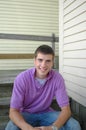 Teenager sitting on steps