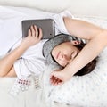 Teenager sleep with Tablet Computer Royalty Free Stock Photo