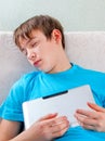 Teenager sleep with Tablet