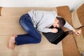 Teenager sleeps on Laptop