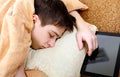 Teenager sleeps with Tablet Royalty Free Stock Photo