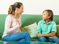 Teenager son and mother having serious talking Royalty Free Stock Photo