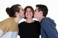 Teenager sons boy kissing their mother woman Royalty Free Stock Photo