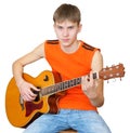 A teenager with a Spanish guitar Royalty Free Stock Photo