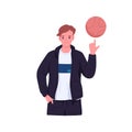 Teenager spinning, rotating ball with finger. Boy athlete demonstrate skill. Young teen basketball player portrait