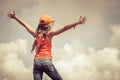 Teenager standing on a mountain top Royalty Free Stock Photo