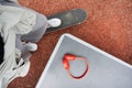 Teenager standing with one leg at the skate and preparing to taking his headphones Royalty Free Stock Photo