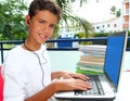 Teenager student happy boy laptop earphones Royalty Free Stock Photo
