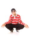 Teenager in sunglasses sitting on the floor Royalty Free Stock Photo