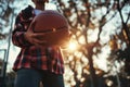 Teenager sweatshirt holding basketball young guy man sport athlete game autumn street city outside competition