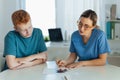 Teenager taking Rorschach test during psychological therapy with adolescent psychologist. Psychological session for Royalty Free Stock Photo