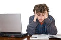 Teenager tired studying for examination Royalty Free Stock Photo