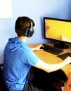 Teenager using computer