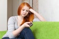 Teenager waits telephone call after quarrel Royalty Free Stock Photo