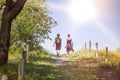 Teenager walking a path at noon