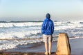 Teenager Watching Ocean Waves Royalty Free Stock Photo