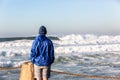 Teenager Watching Ocean Waves Royalty Free Stock Photo