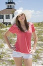 Teenager wearing hat on beach