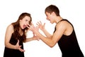 Teenagers boy and girl quarreling, gesticulating and shouting