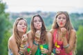 Teenagers with bubble pipes Royalty Free Stock Photo