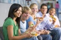 Teenagers enjoying lunch together