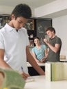 Teenagers Examining DNA Model Royalty Free Stock Photo