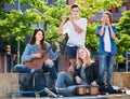 Teenagers friends playing musical instruments Royalty Free Stock Photo