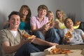 Teenagers Having Fun And Eating Pizza