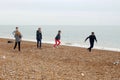 Teenagers having fun on Hastings beach