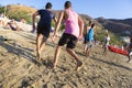 Teenagers playing on beach of Taganga in Colombia Royalty Free Stock Photo