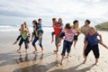 Teenagers playing piggyback