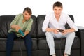 Teenagers playing with playstation