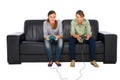 Teenagers playing with playstation