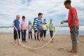 Teenagers playing skipping rope