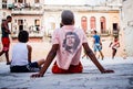 Teenagers plays soccer on a playground, Havana