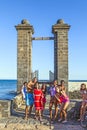 Teenagers posing at the entrance of the Castillo de San Gabriel in Arrecife, Lanzarote, Canary Islands Royalty Free Stock Photo