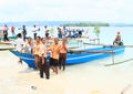 Teenagers helping to pilgrims comming to Mansinam