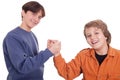 Teenagers shaking hands