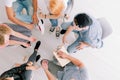 Teenagers sitting in circle