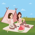 Teenagers sitting on the ground in front of tents, camping girls fun friendship