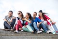 Teenagers with skates outside