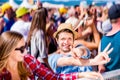 Teenagers at summer music festival enjoying themselves Royalty Free Stock Photo