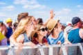 Teenagers at summer music festival enjoying themselves Royalty Free Stock Photo