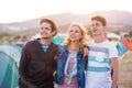 Teenagers at summer music festival, sunset Royalty Free Stock Photo