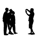Teenagers tourists crew taking picture on vacation vector silhouette illustration isolated. Mobile phone photographer. Royalty Free Stock Photo