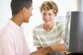 Teenagers Using Desktop Computer Together