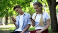 Teenagers using phone instead of interacting, lack of communication, addicted